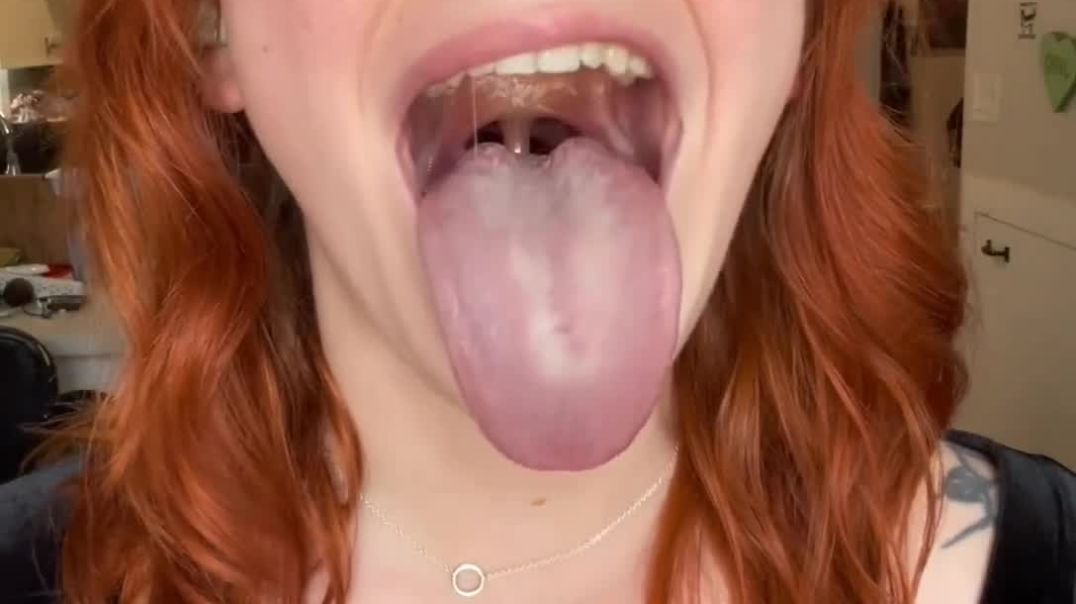 Tongue and spit from a cute redhead - ThisVid com - hostname
