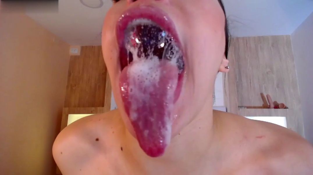 Jerking her sexy long tongue