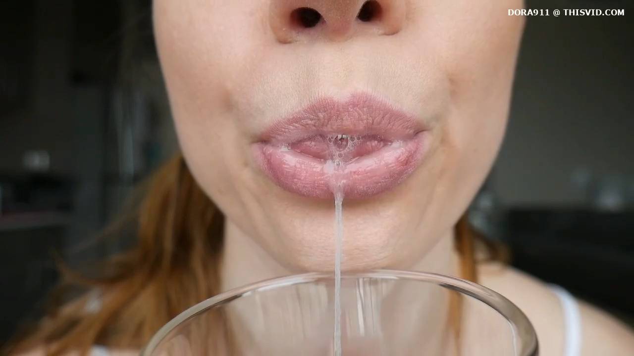 Sexy girl is collecting her spit in glass - ThisVid